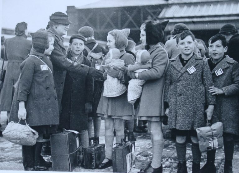 Evacuation In War Children With Labels And Dolls And Parcels Of Belongings