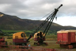 Excavators Threlkeld Quarry Blencathra behind Threlkeld Quarry