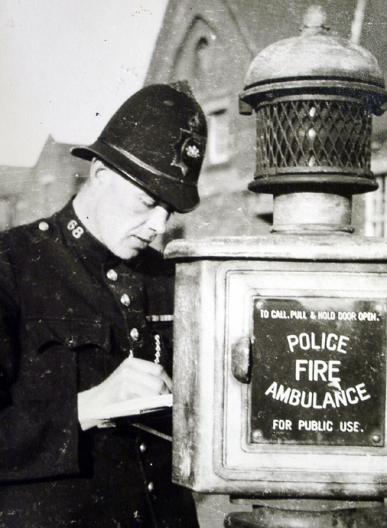 Policeman At Box Close